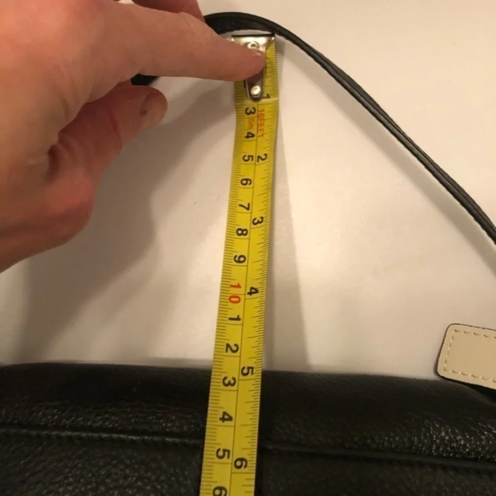 Coach black leather mini clutch wristlet bag